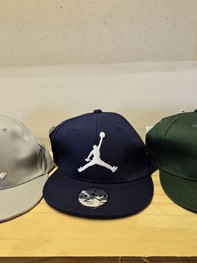 Jordan Navy Blue Snapback Hat with White Jumpman